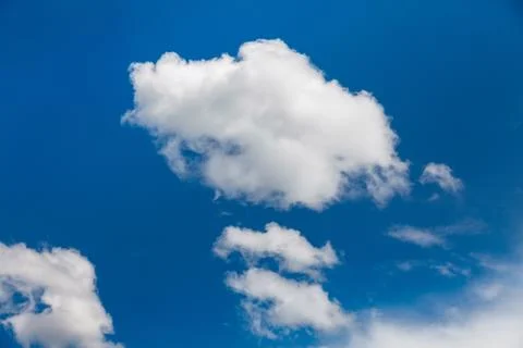 Set of white clouds over blue Stock Photos
