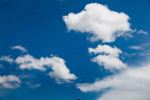 Set of white clouds over blue Stock Photos