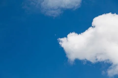 Set of white clouds over blue Stock Photos