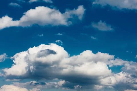 Set of white clouds over blue Foto stock