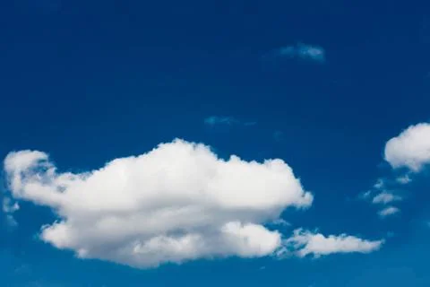 Set of white clouds over blue Stock Photos