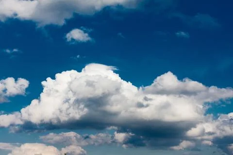 Set of white clouds over blue Stock Photos
