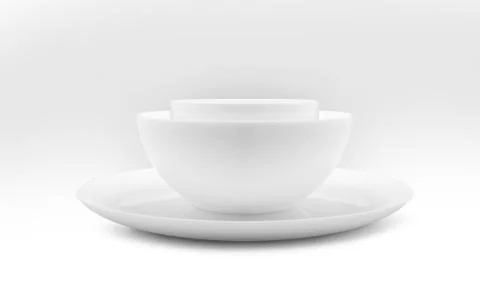 Set of white dishes on table on light background. Stock Photos