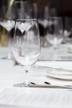 Set up wine glass on the table for dinner at restaurant Stock Photos