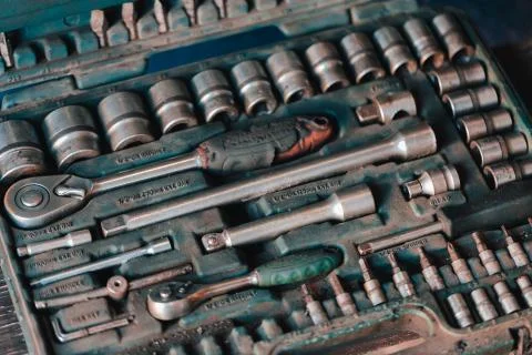 Set of working keys in a suitcase. Stock Photos