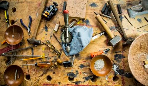 Set of working tools on a vintage workbench Stock Photos