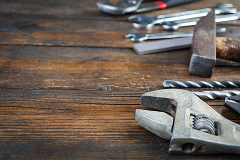 Set of working tools on wooden rustic background Stock Photos