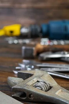Set of working tools on wooden rustic background Stock Photos