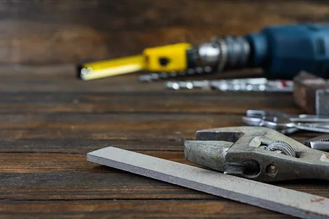 Set of working tools on wooden rustic background Stock Photos