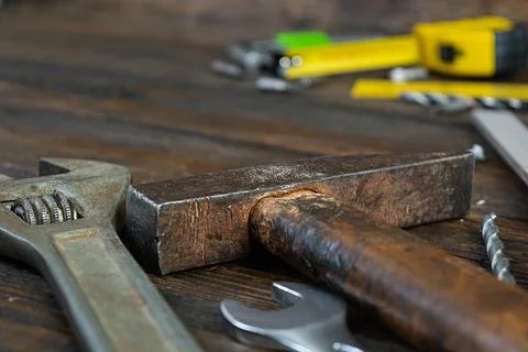 Set of working tools on wooden rustic background. Top view. Copy space Stock Photos