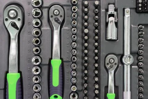 A set of wrenches in a plastic box. A set for car repair. Close-up photo. Stock Photos