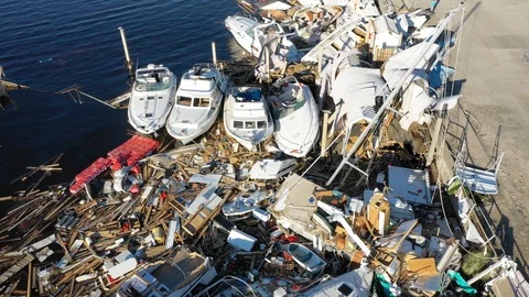 Set of yachts destroyed in Florida harbor after Hurricane Michael Stock Footage 98790443