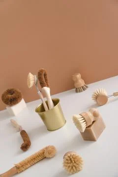 Set of zero waste bamboo brushes for dishwashing in minimalistic style Stock Photos