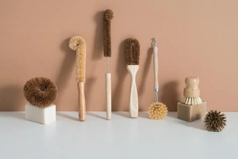 Set of zero waste bamboo brushes for dishwashing in minimalistic style Stock Photos