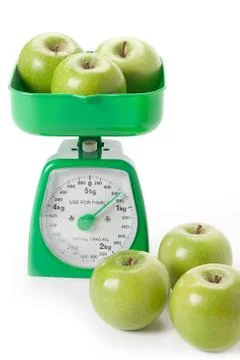 Sets of green apples weighed Stock Photos