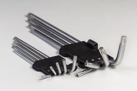 Sets of L-keys with 6-point star-shaped tips Foto stock