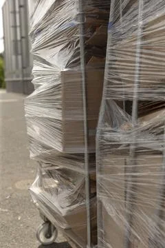Sets of ready pallets positioned adjacent to production units Photos