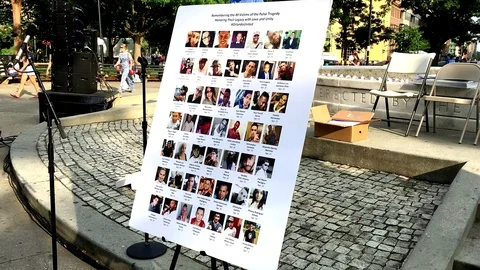 Setting up for 1-year anniversary of the mass shooting in Orlando  Stock Footage 77490536