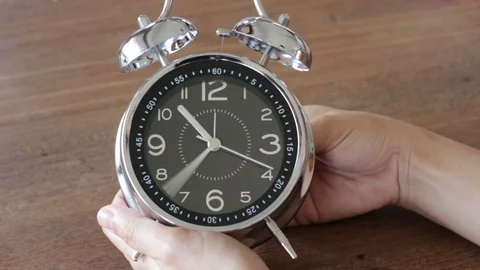 Setting Alarm Clock At 12 O'clock Stock Footage 73500404