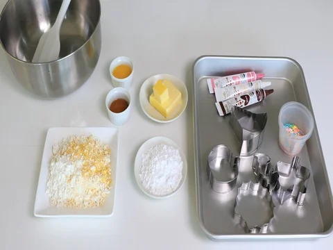 Setting all ingredients on table for making cookies and taking one by one Stock Footage 81352403