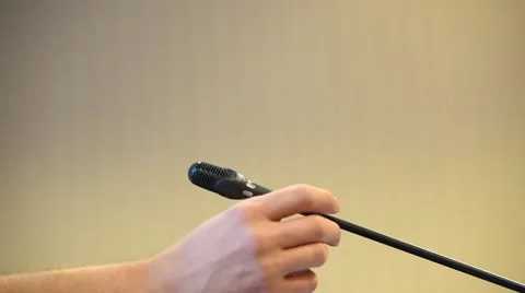 Setting up and testing a press conference microphone Stock Footage