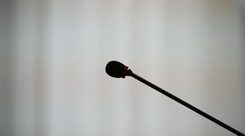 Setting up and testing a press conference microphone Vídeo Stock 67665973