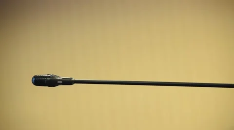 Setting up and testing a press conference microphone Stock Footage
