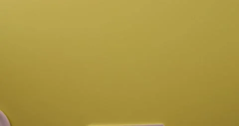 Setting avocados on a cutting board down 1 Stock Footage 132136682