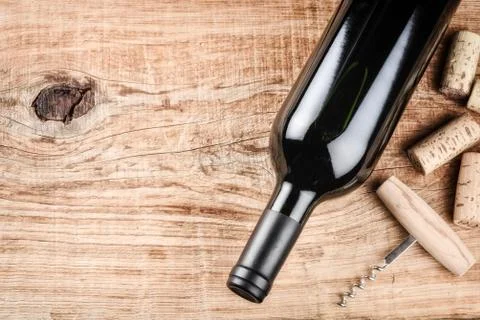 Setting with bottle of red wine and corks. Wine list concept Stock Photos