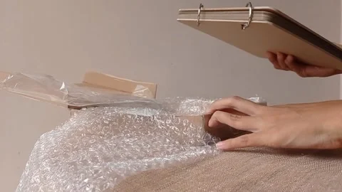 Setting a brown paper to make a diary book Stock Footage 146257530