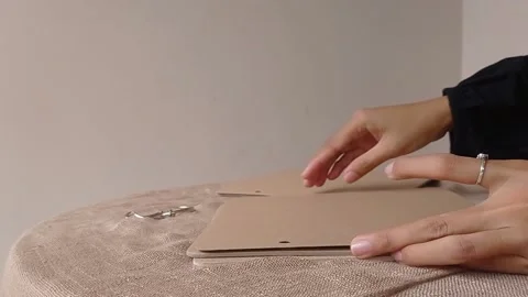 Setting a brown paper to make a diary book Stock Footage 146258254