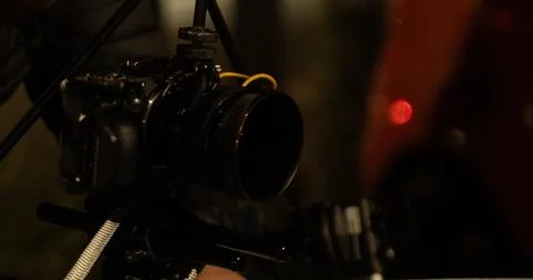 Setting up a camera on top of a tripod to keep it stable on a car. Foto stock