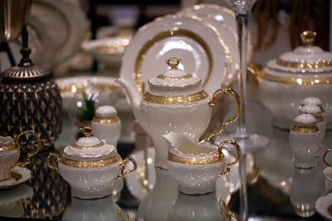 Setting of a classy dining table with luxury porcelain dinnerware Foto stock