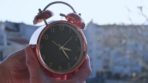 Setting the clock one hour back Stock Footage 330801571