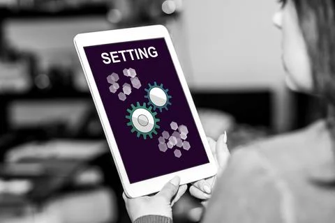 Setting concept on a tablet Stock Photos