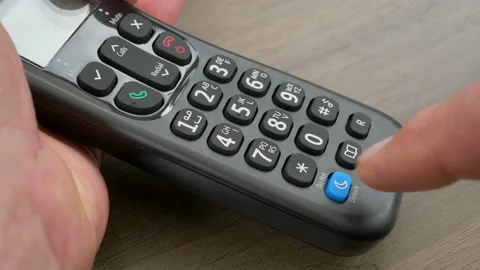Setting a cordless / hands free landline phone to Do Not Disturb mode. Stock-Footage 139920865
