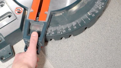 Setting cut angle of miter saw Stock Footage 61149455