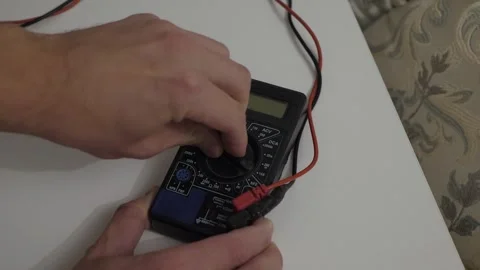 Setting up digital testing meter Stock Footage 327040111