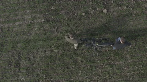 Setting up the drone before the flight over the processing of the field. Stock Footage 188824773