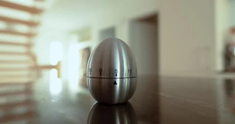 Setting Egg Timer for Cooking Countdown Stock Footage 343884264