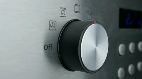 Setting Electric Oven Modes by Turning Switch Control Close Up Stock Footage 125898033