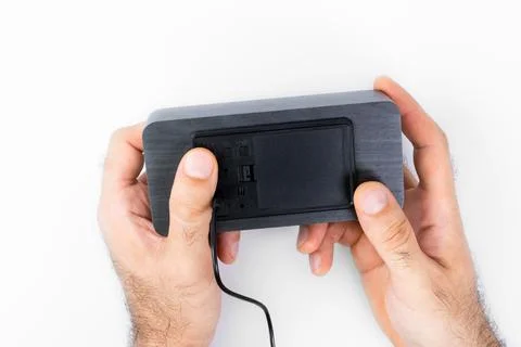 Setting up an electronic watch by hand Foto stock