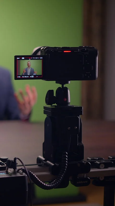 Setting Up a Filming Environment with a Camera Placed Firmly on a Tripod in Video stock 296011141