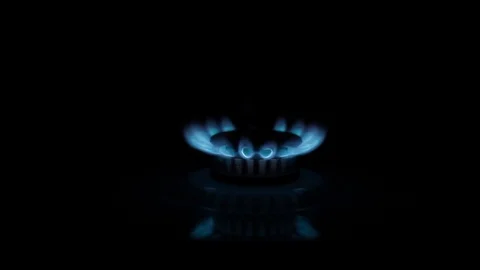 Setting fire gas on a kitchen stove Stock Footage 116504430