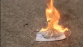 setting fire to surgical mask HD Footage