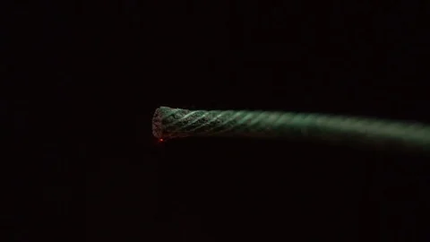 Setting fire to wick of the bomb dynamite or petard in slow motion Stock Footage 108985556
