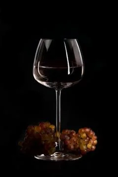 Setting with fresh grape and wine in glass Stock Photos