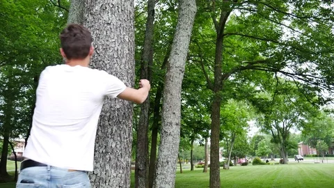 Setting up a hammock eno outside 스톡 동영상 76222613