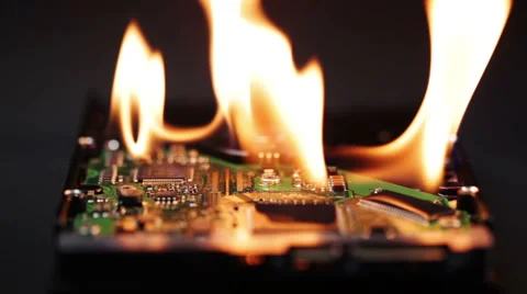 Setting a hard disk on fire Stock Footage 41338260