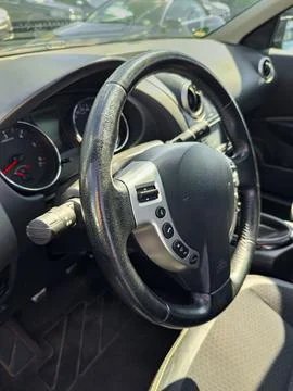 This setting highlights the interior of a vehicle, emphasizing the steering w Stock-Fotos